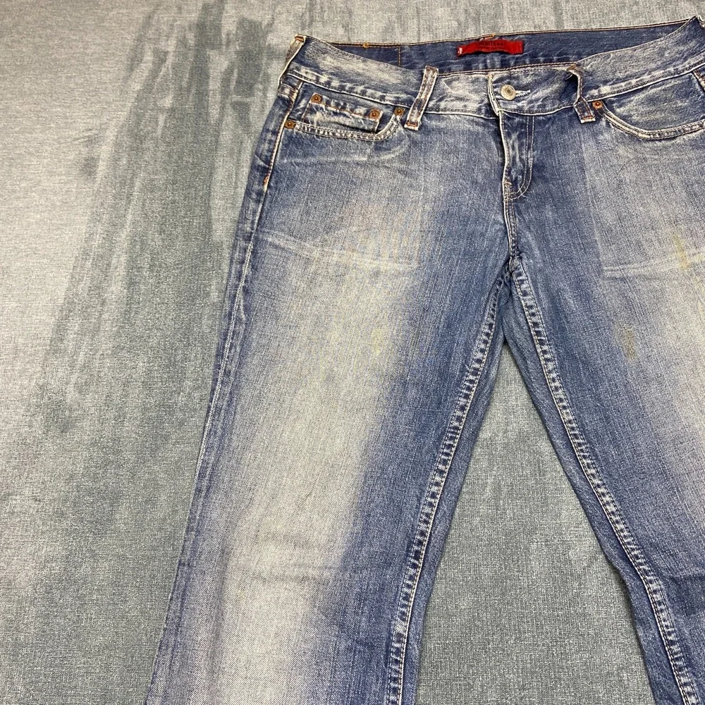 Vintage Levi's 569 Jeans Women 03 30x32 Blue Denim Medium Wash Flare Leg Raw Hem